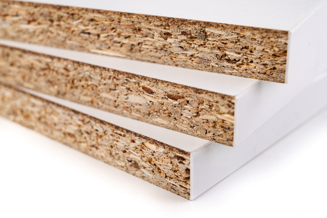 Three wooden planks with a white base on a white background