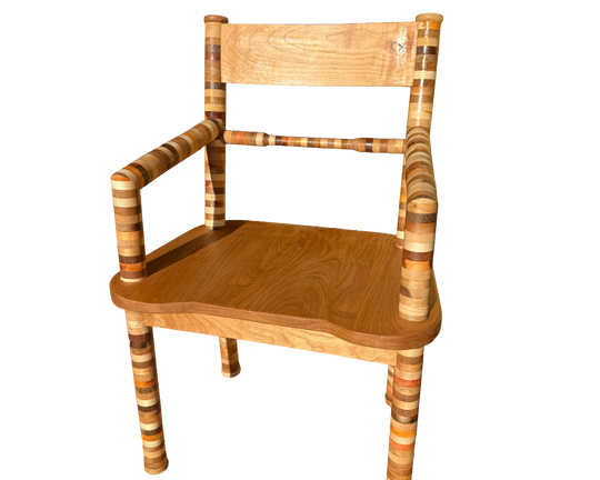 A wooden dining chair with a solid wood seat and backrest, paired with striped wooden armrests and legs, shown against a plain white background.